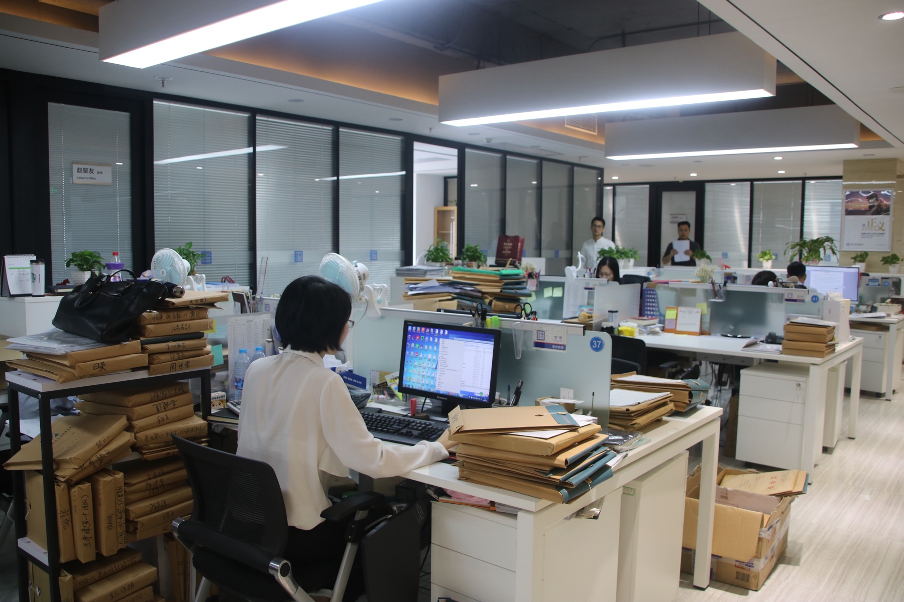 China IP Pro staff handling day-to-day matters in the open office